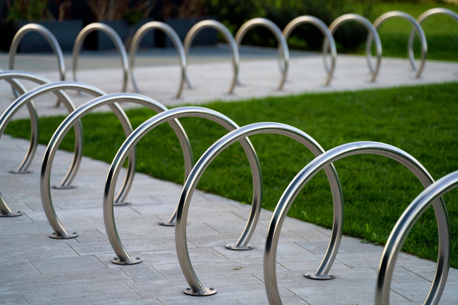 Citylife, modern park in Milan, Lombardy, Italy, with the Three Towers. Bicycle rack