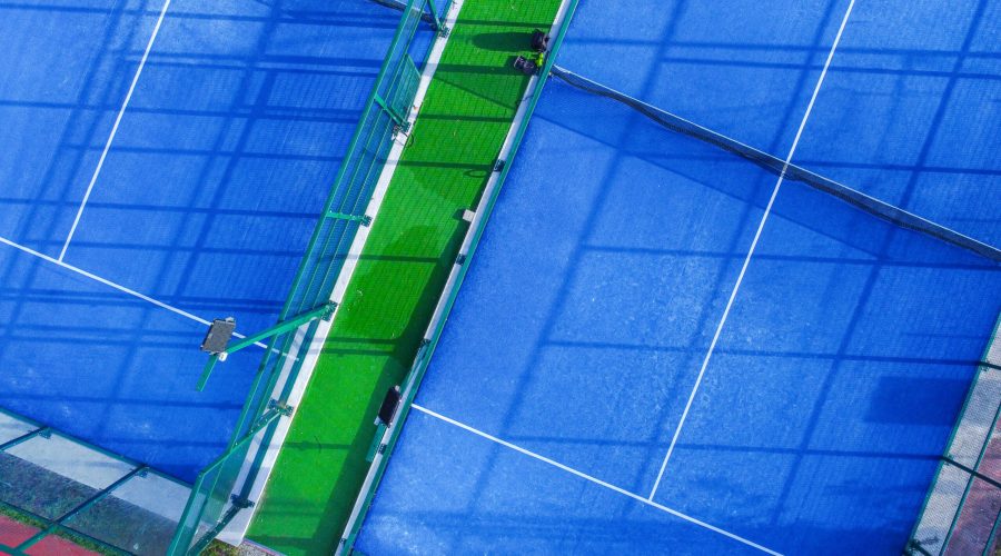 An aerial view of a part of two paddle tennis courts