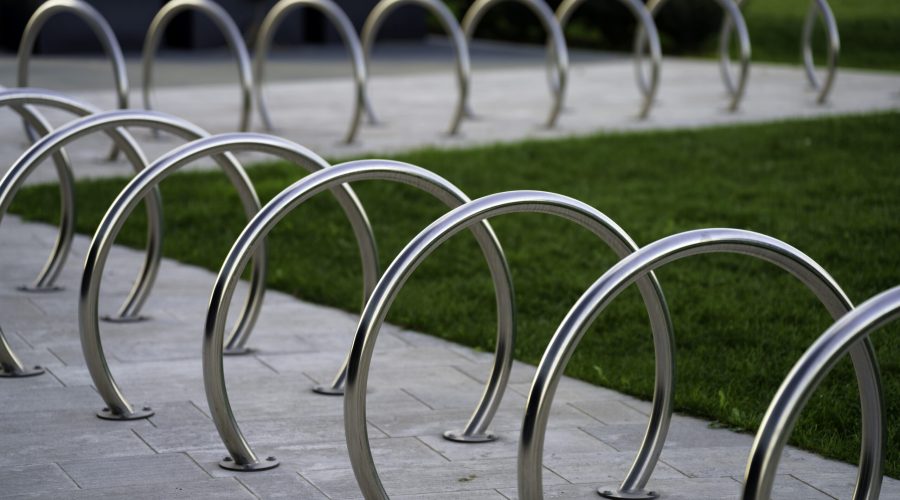 Citylife, modern park in Milan, Lombardy, Italy, with the Three Towers. Bicycle rack